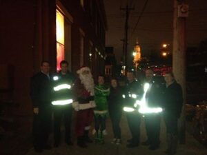 BDFD assisting Santa Claus to deliver gifts to children